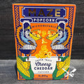 CHEESY CHEDDAR POPCORN, MAZE